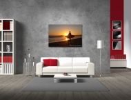 Surfer im Sonnenuntergang